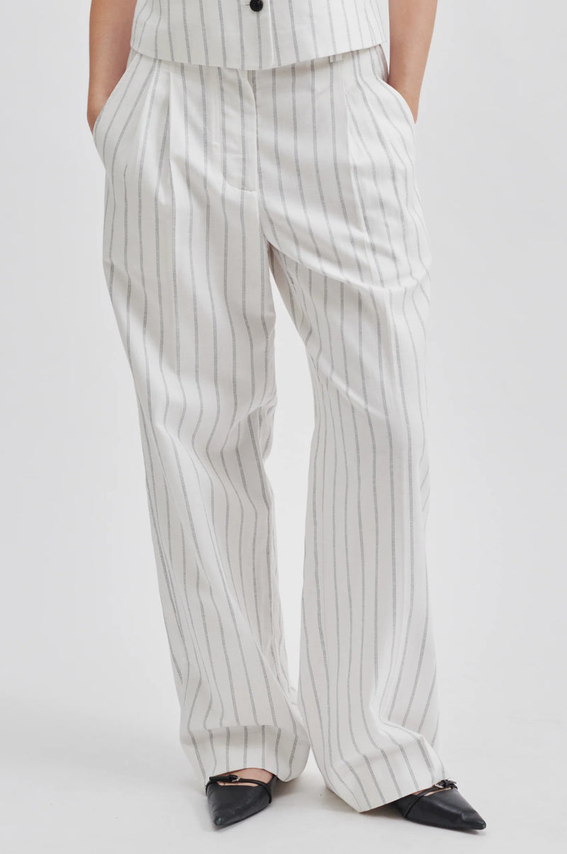 Straight to wide leg trousers in ecru with contrast pinstripe pleated fronts side pockets and elasticated back waist panel