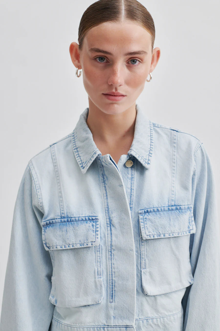 Light denim boxy jacket with collar and two front flap patch pockets