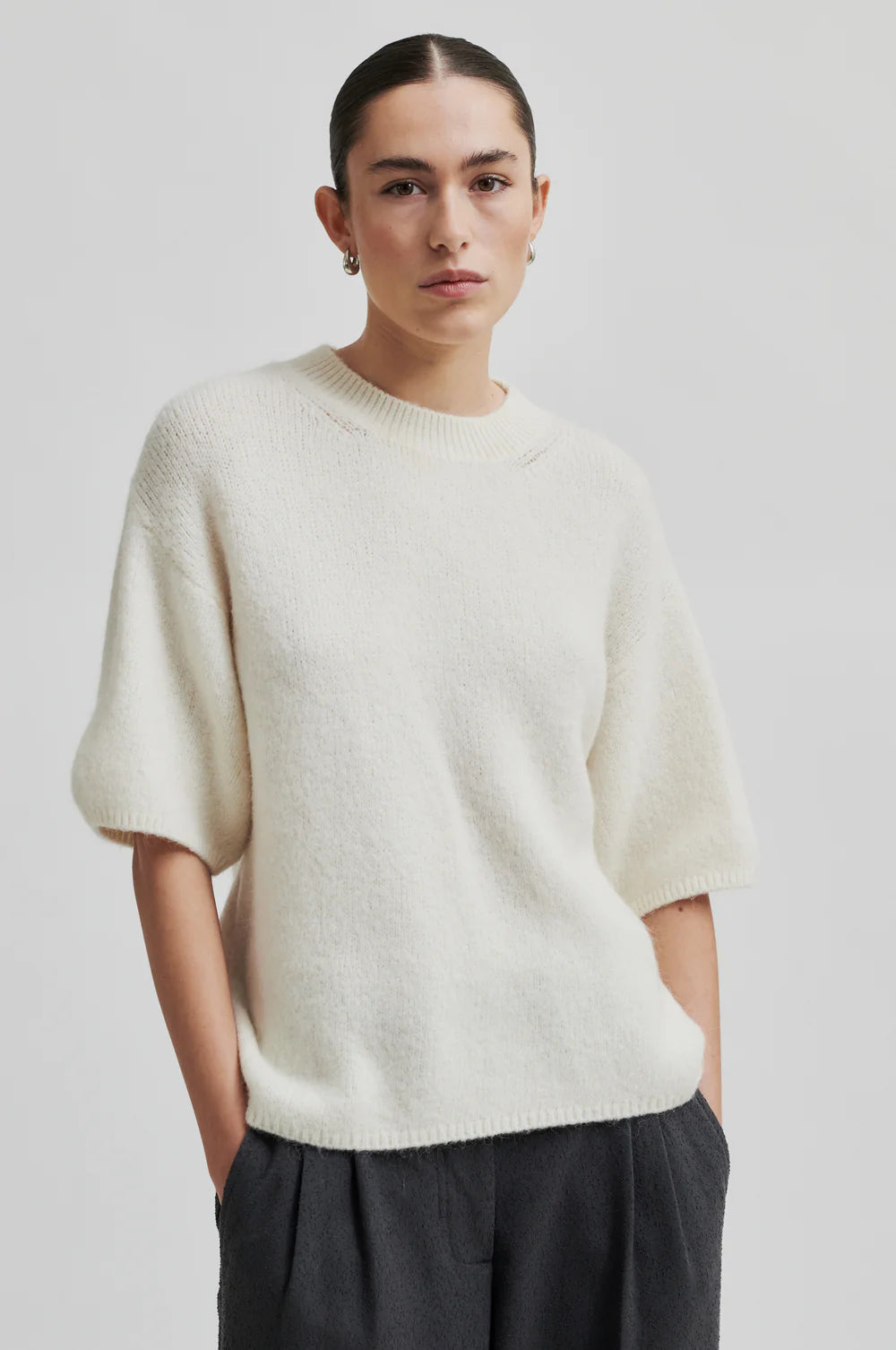 off white jumper with o neck and 3/4 sleeves model shot