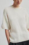 off white jumper with o neck and 3/4 sleeves