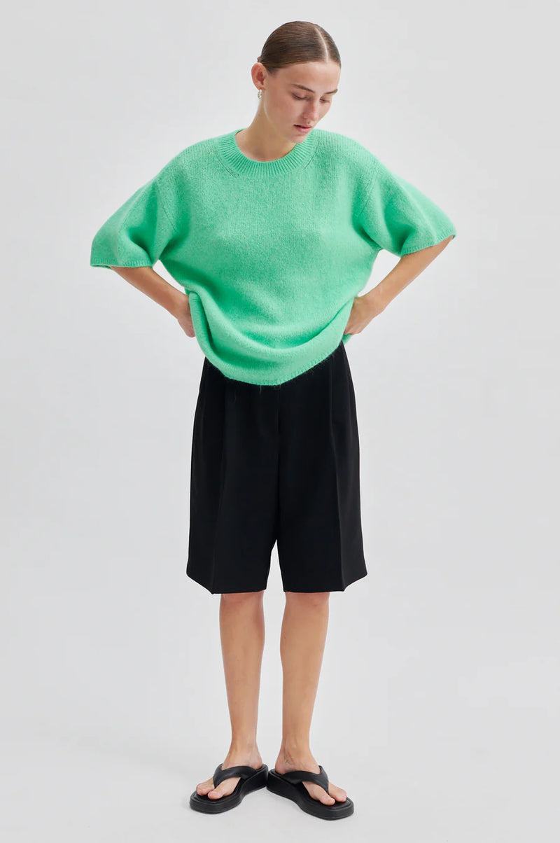 Green short sleeved knitted jumper with crew neck