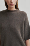 dark brown 3/4 length sleeve jumper with round neck close up