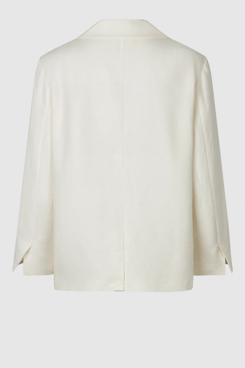 White linen jacket with single breasted solo black button fastening