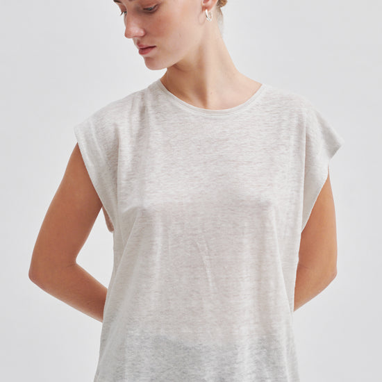 white t-shirt with deep arm holes and round neck