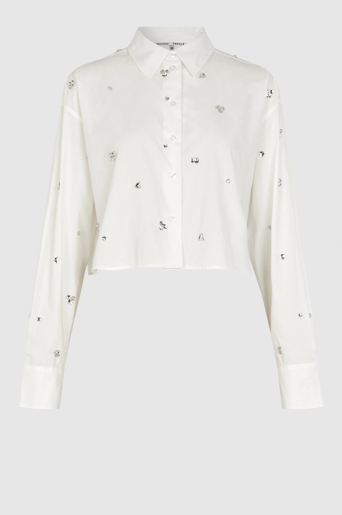 Cropped boxy white long sleeved shirt with scattered sewn on chunky gems