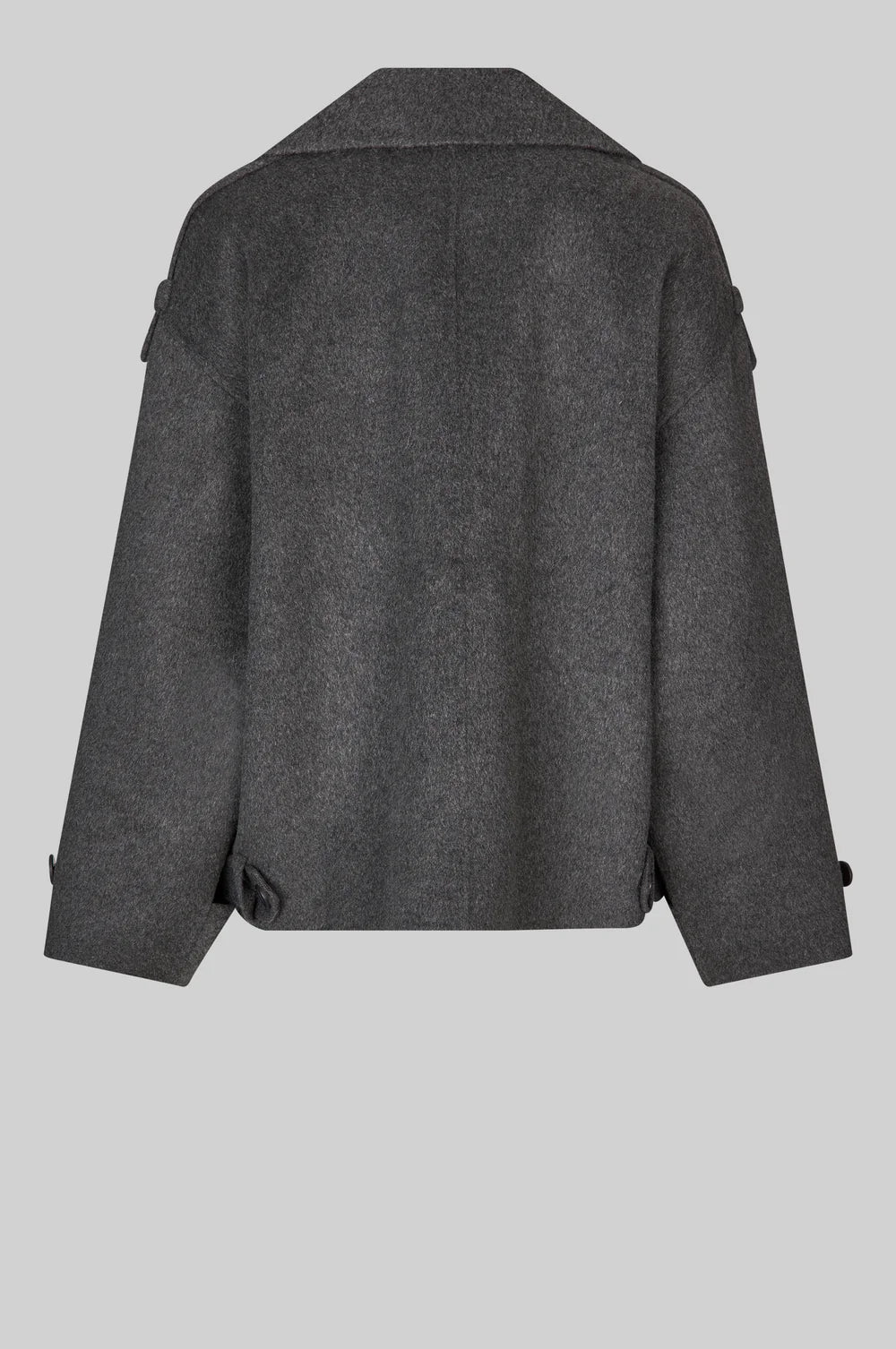 dark grey short jacket with asymmetric button and one side patch pocket rear view