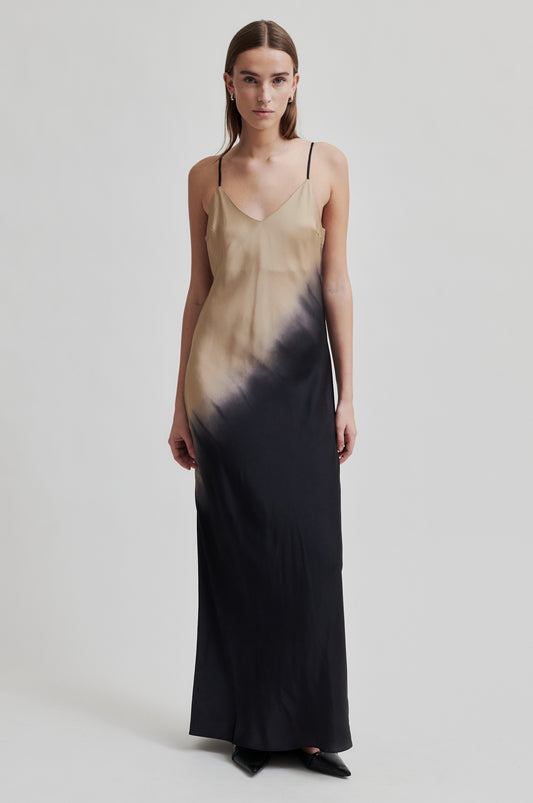 thin strap maxi length viscose slip dress with black and beige two tone design model shot