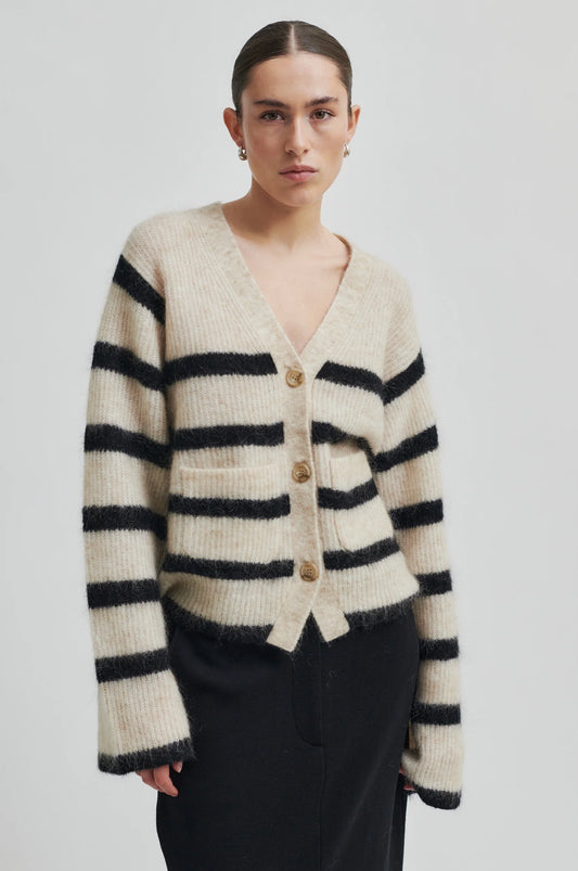 beige mohair blend cardigan with 3 buttons, 2 patch pockets and long sleeves with black stripes 