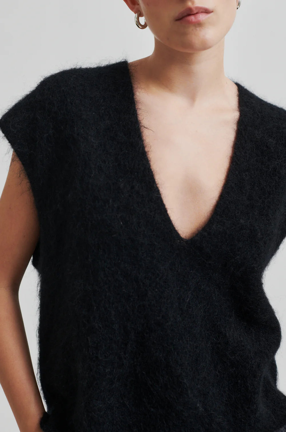 stretchy mohair black vest with v neck close up