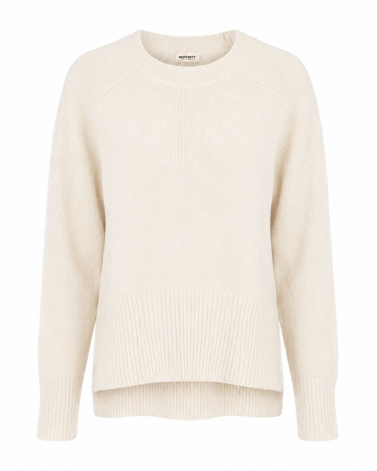 An off-white ribbed knit crewneck sweater with raglan sleeves, shown against a plain white background.