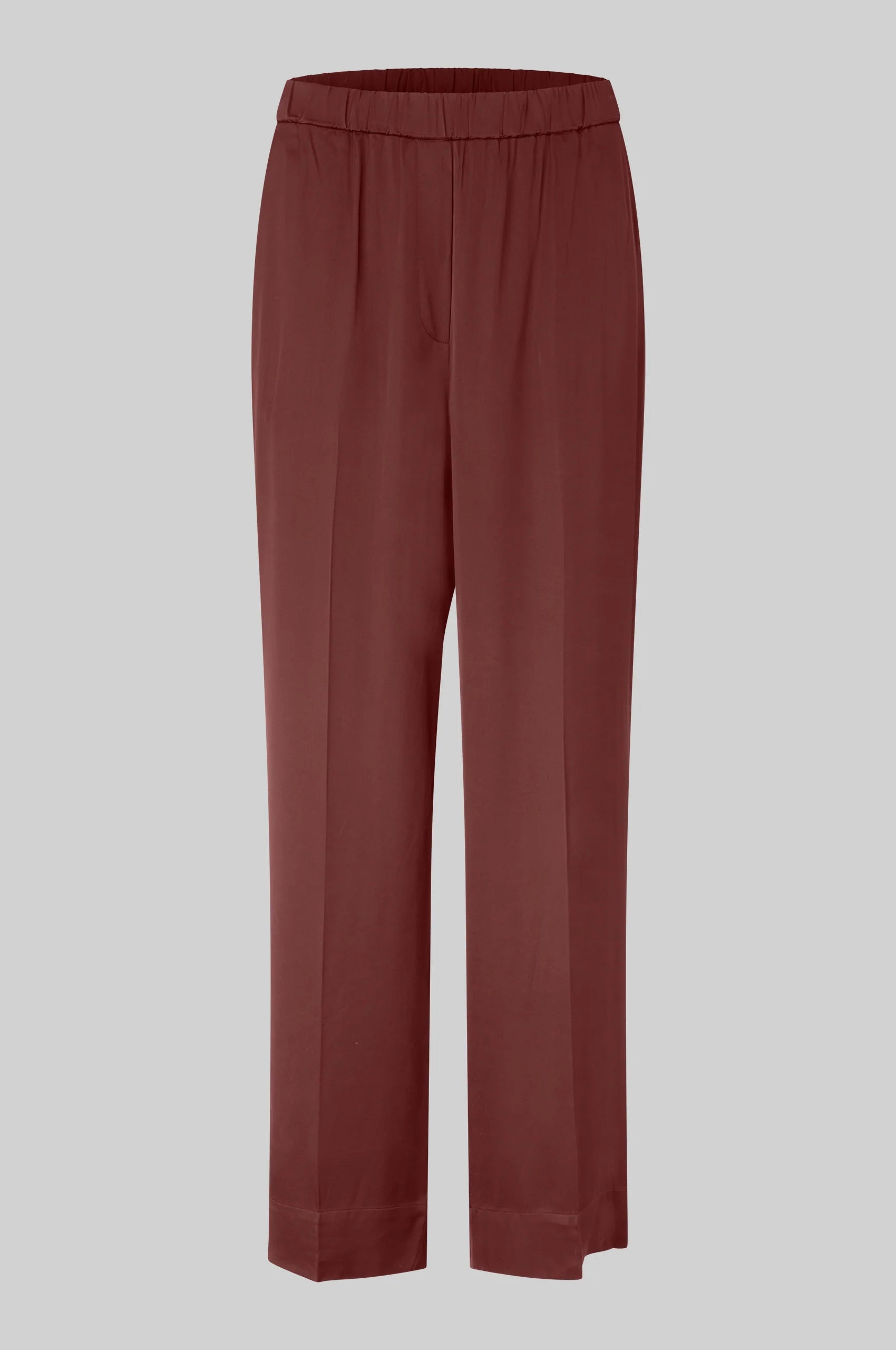 brown silky elasticated waist trousers with side pockets and rear welt pockets 