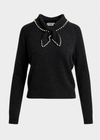 black knit sweater with a pearl-trimmed bow collar 