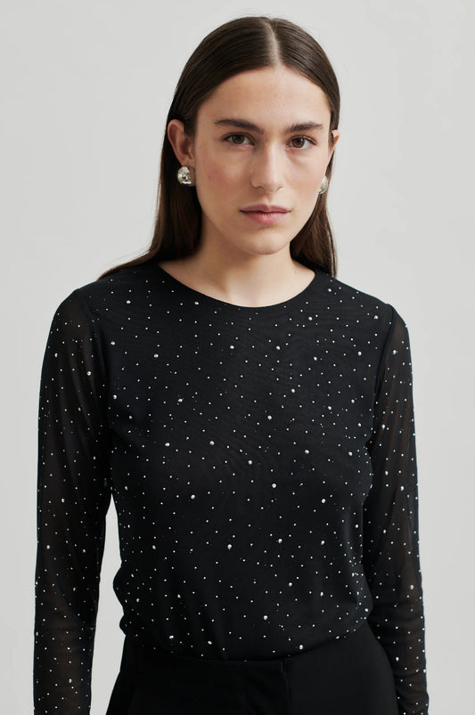 black mesh round neck top with rhinestone covering and long sleeves  model shot