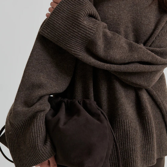 Turtleneck wool mix brown jumper with rib detailing close up