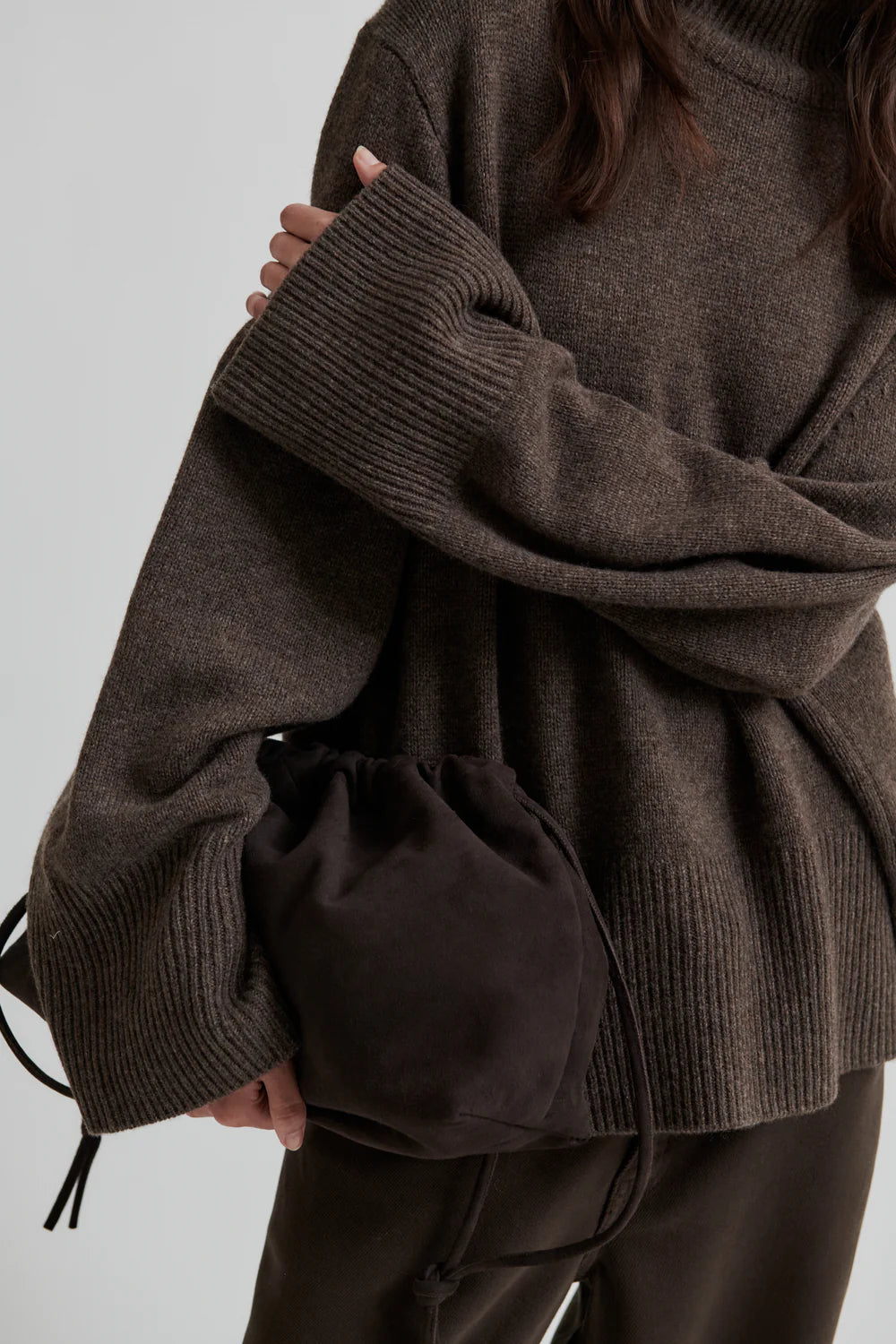 Turtleneck wool mix brown jumper with rib detailing close up