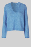 blue v neck knit with long sleeves and side splits 