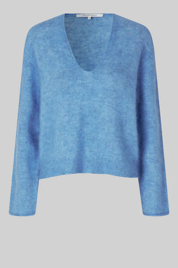 blue v neck knit with long sleeves and side splits 