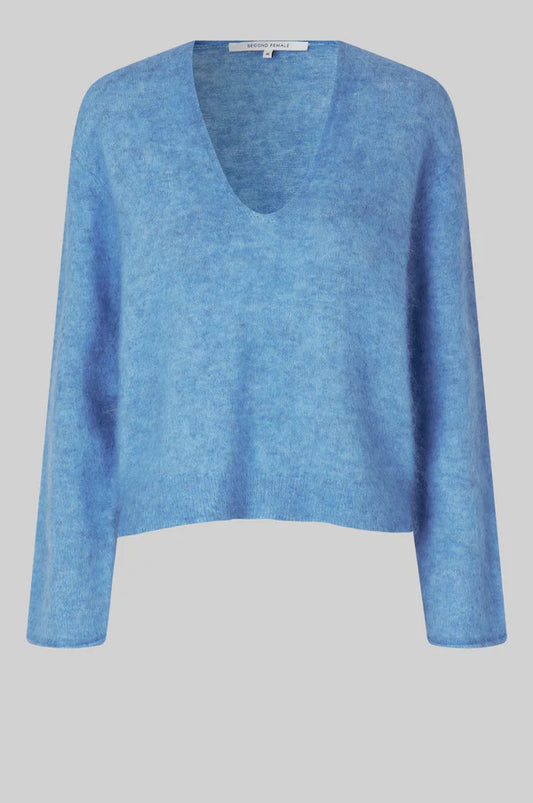 blue v neck knit with long sleeves and side splits 