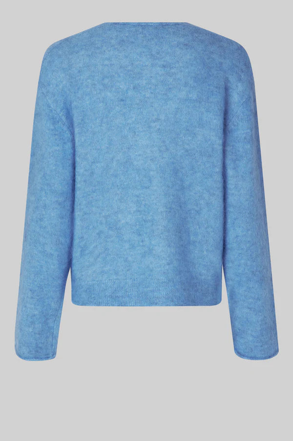 blue v neck knit with long sleeves and side splits rear view 