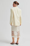 Rear view of Cream blazer worn with lace detail skirt from Second Female