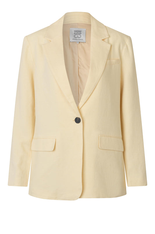 single breasted cream blazer with two front flap pockets from second female