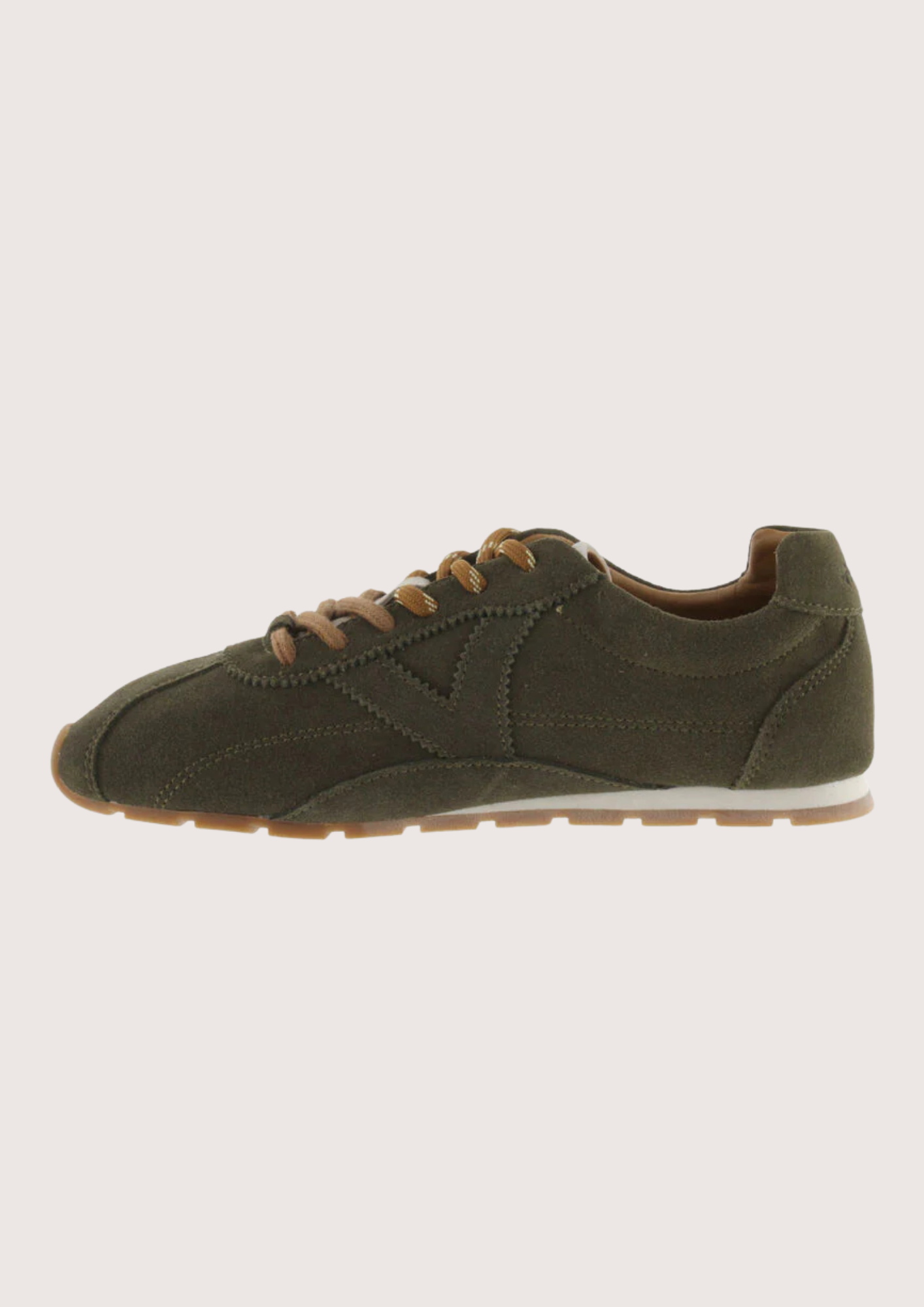Khaki suede sneaker with beige sole on a plain background