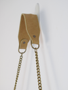  suede bag with gold scarab detail