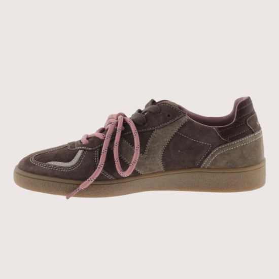 A low-top sneaker in dark brown suede and canvas with dusty pink laces and a tan gum sole, shown from a side profile on a light gray background.