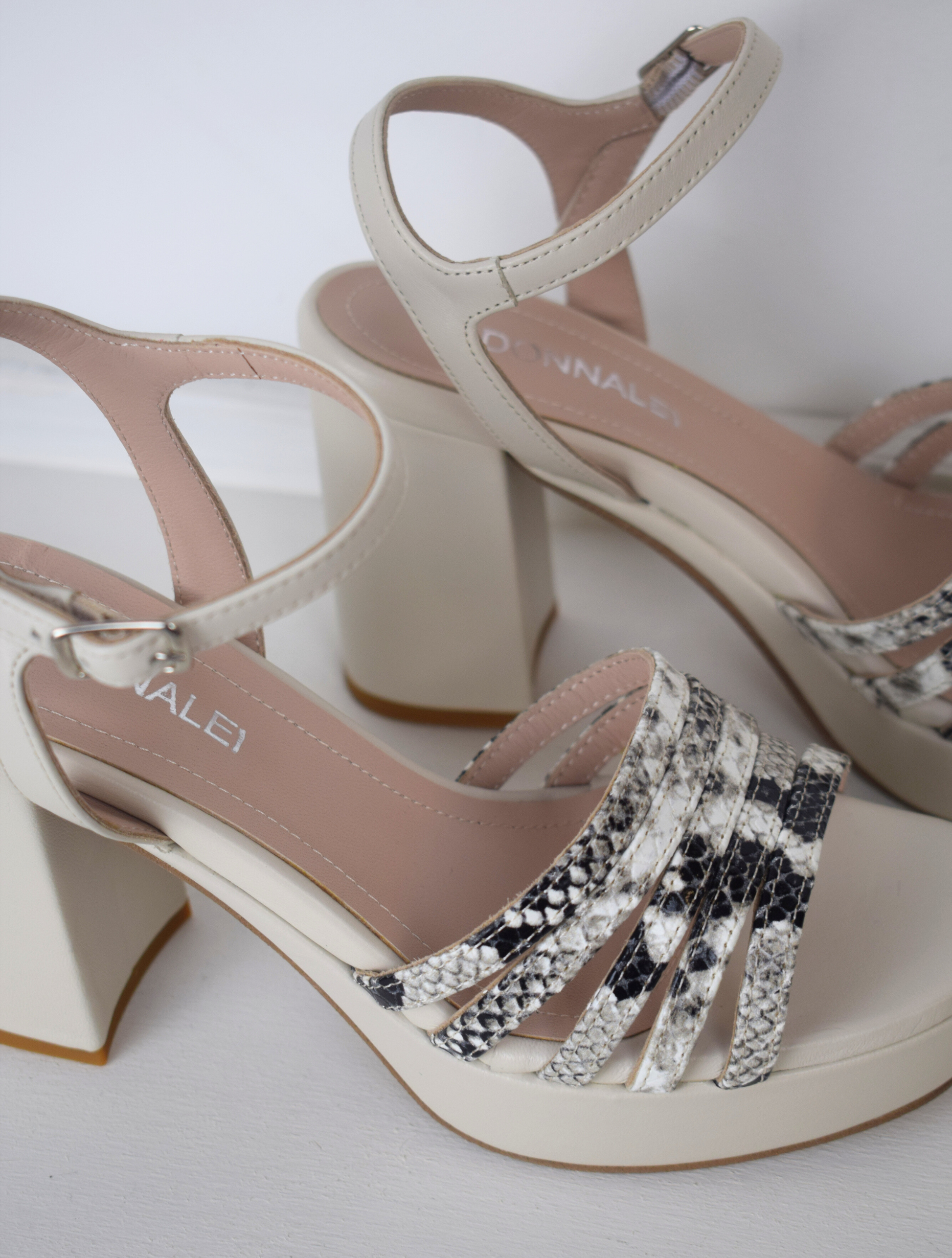 Off white platform heel with snake print straps 