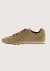Brown suede shoe on a white background