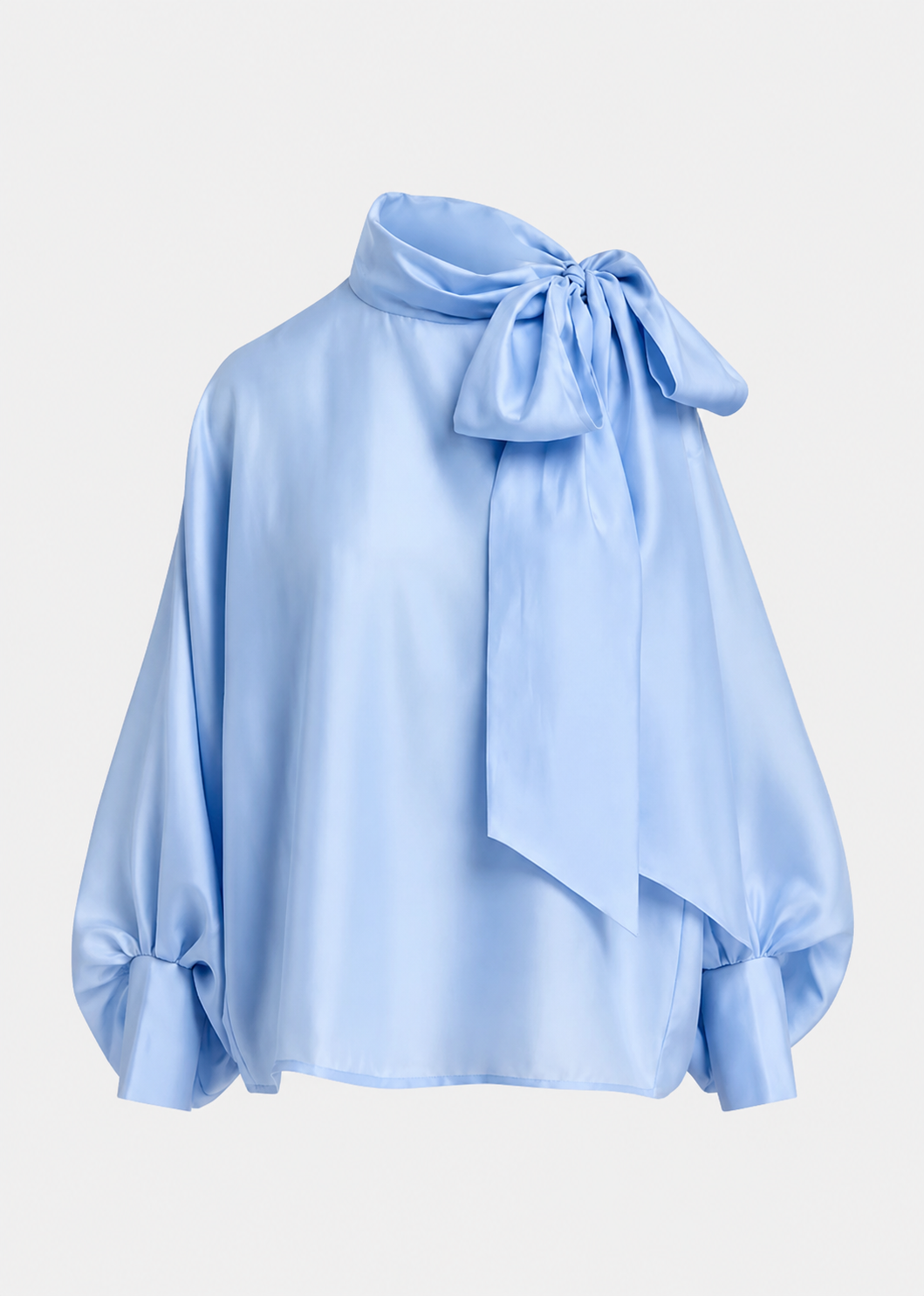A light blue satin blouse with a large bow at the high neck and gathered balloon sleeves, shown on a plain light gray background.