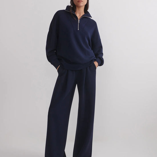 extra wide leg navy elasticated waistband trousers from varley model shot