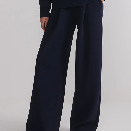 extra wide leg navy elasticated waistband trousers from varley model shot