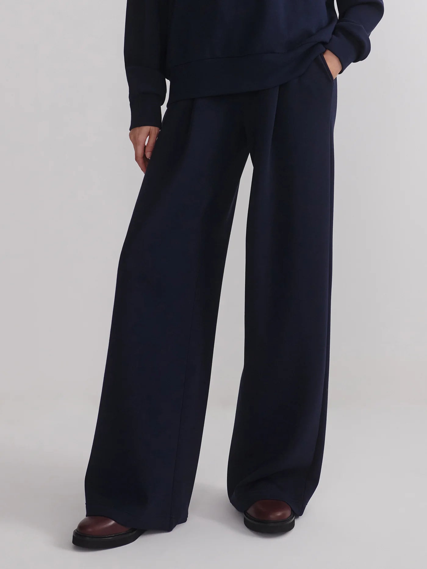 extra wide leg navy elasticated waistband trousers from varley model shot