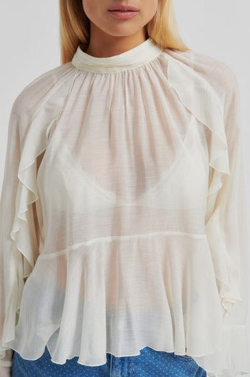 White sheer blouse with long sleeves on a white background from second female