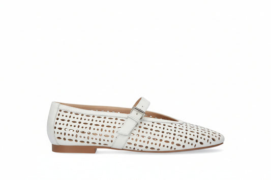 white flat shoe with cutouts 