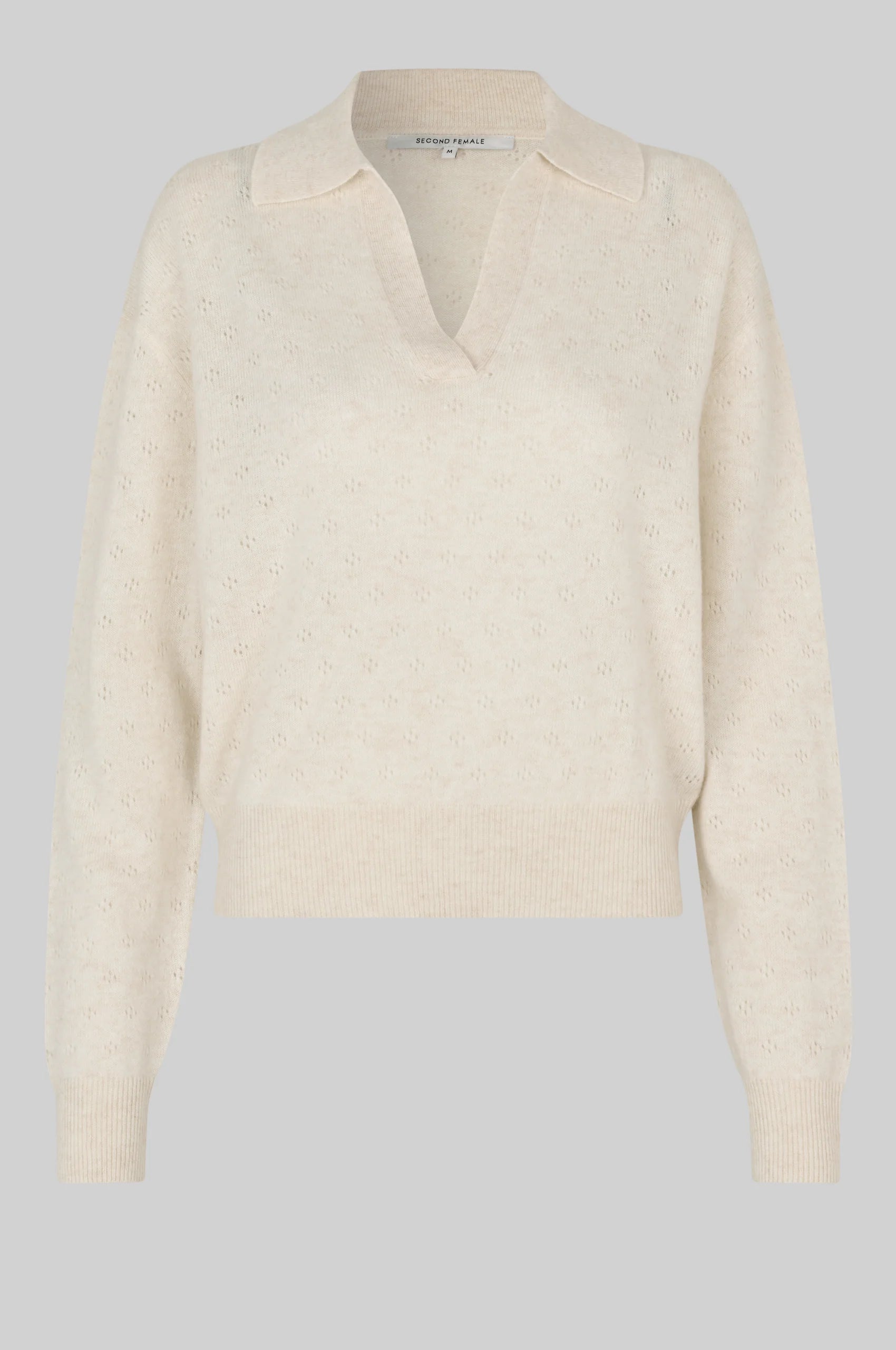 Beige long-sleeve shirt on a light gray background from Second Female
