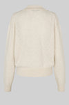 Beige sweater on a light gray background