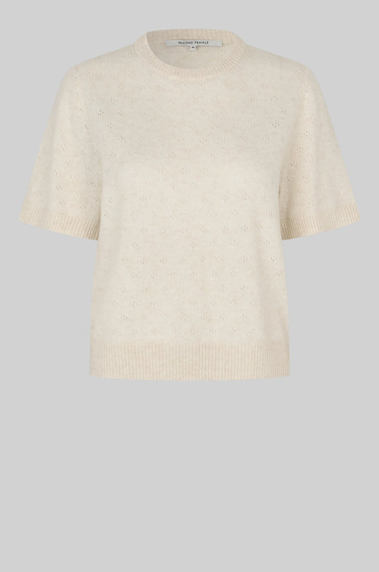 Beige knitted sweater on a light gray background from second female