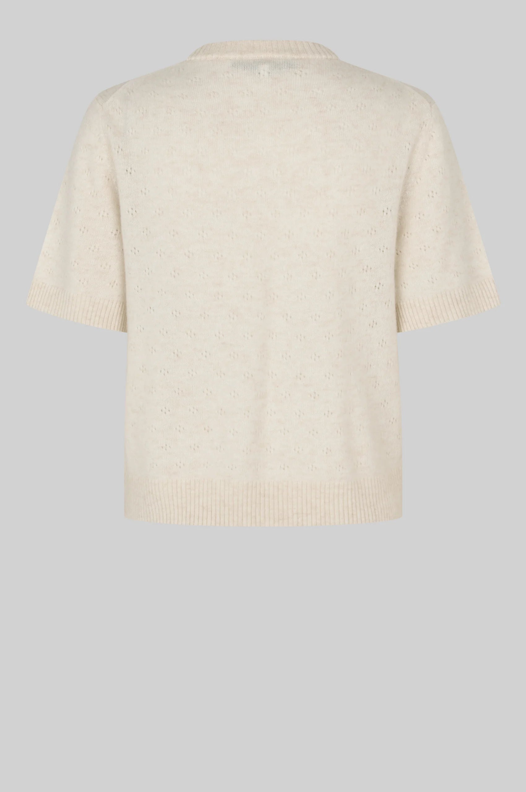 Beige sweater on a light gray background