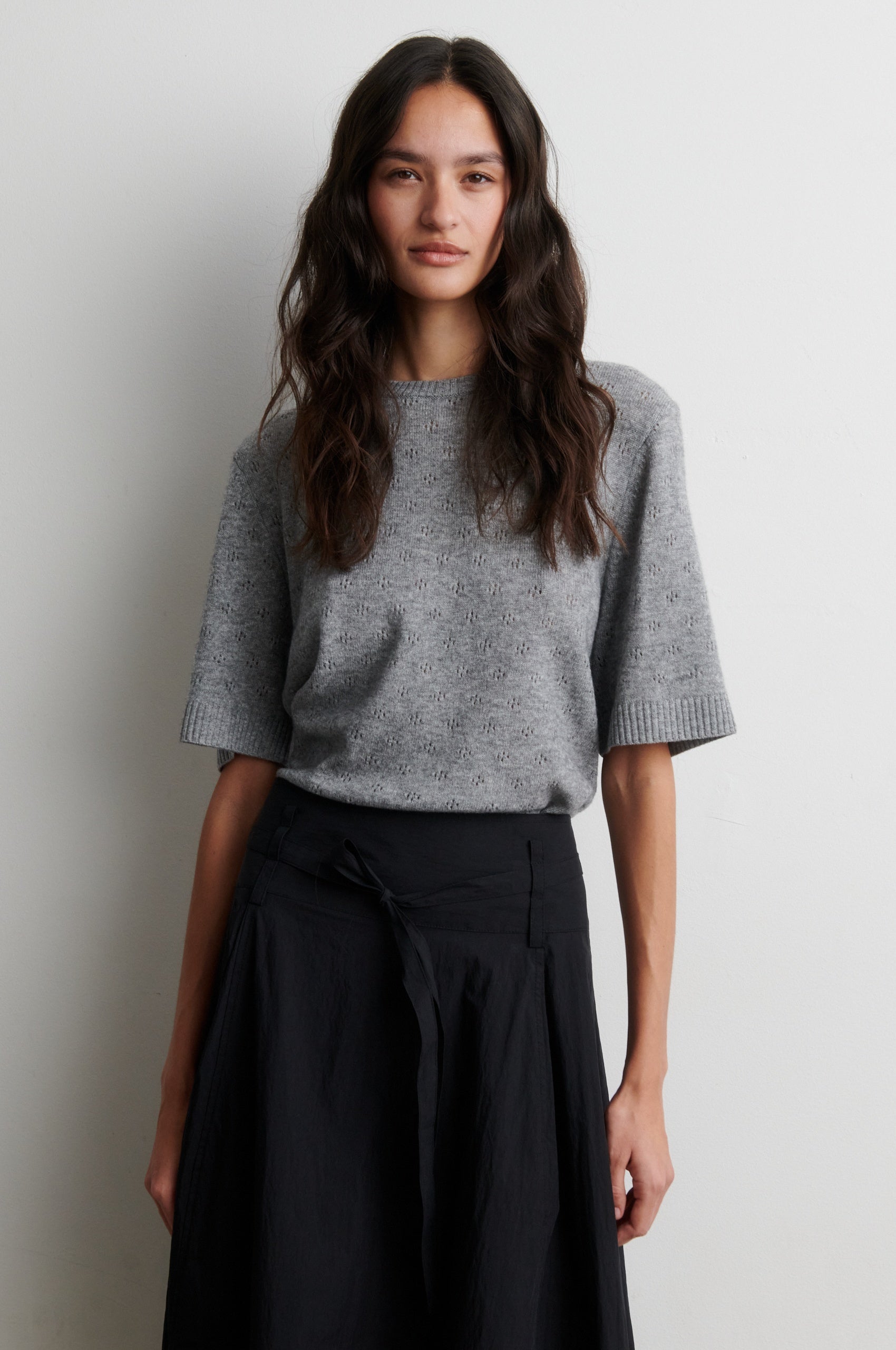 Round neck short sleeve cashmere blend jumper from Second Female worn with black skirt