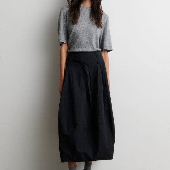 Short sleeved cashmere blend grey knit worn with a black skirt from Second Female