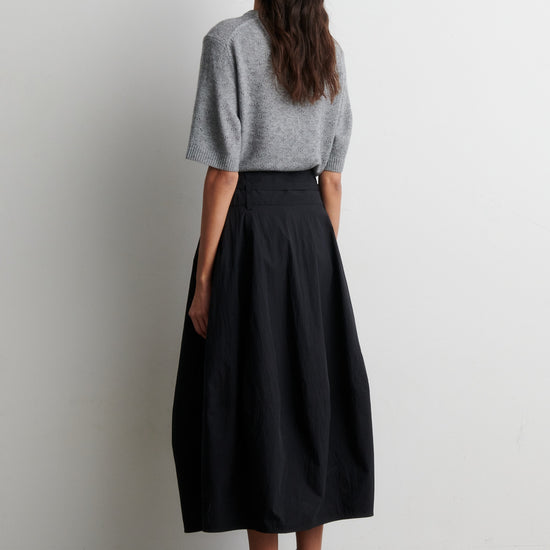 Rear view of grey cashmere blend short sleeve knit worn with black skirt from Second Female
