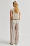 Rear view of Woman wearing a beige sleeveless top and wide-leg pants on a white background from Second Female