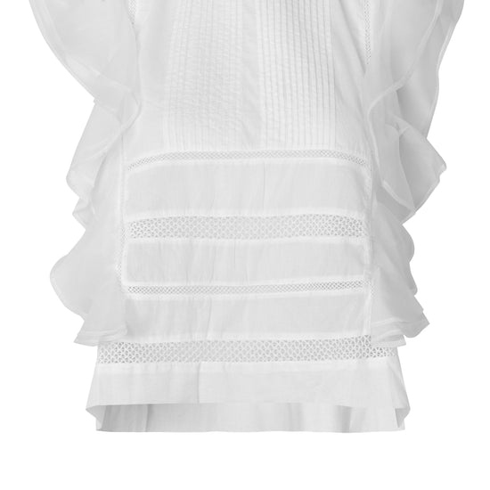 White ruffled blouse on a white background from second female
