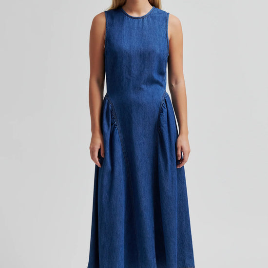 Blue denim dress by second female on a woman