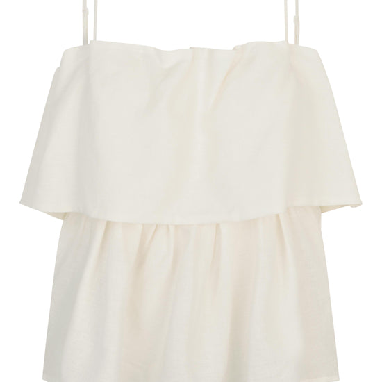 Off White top with spaghetti straps and ruffled layers on a white background from second female