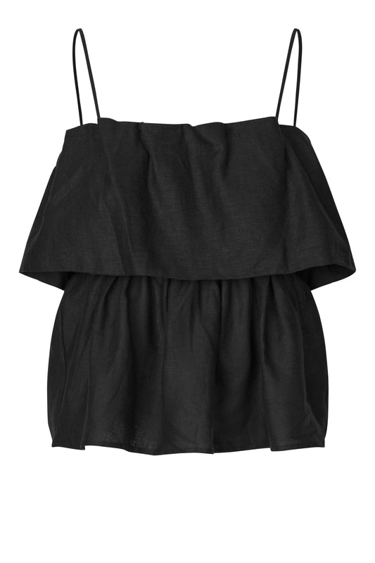 Black layered top with thin straps on a white background from second female