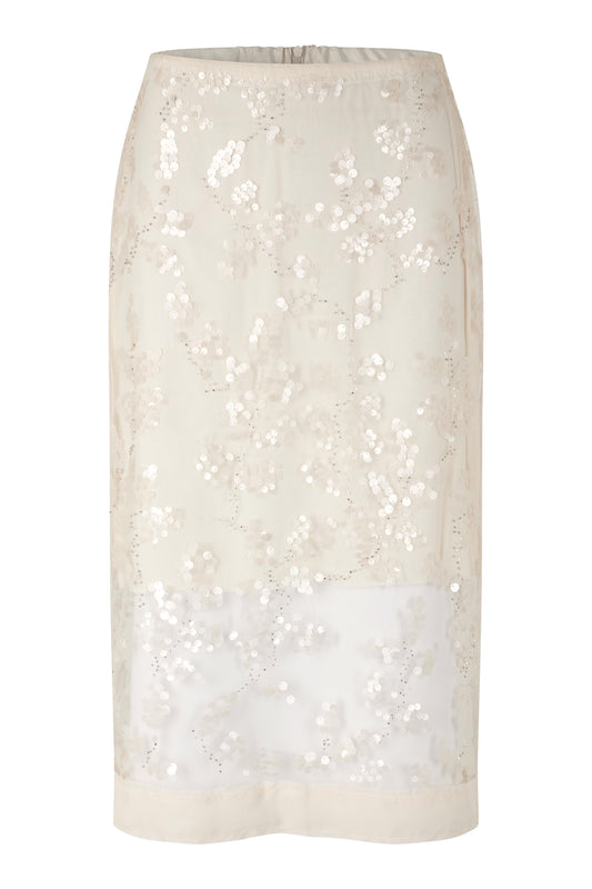 White sequin skirt on a white background from second female