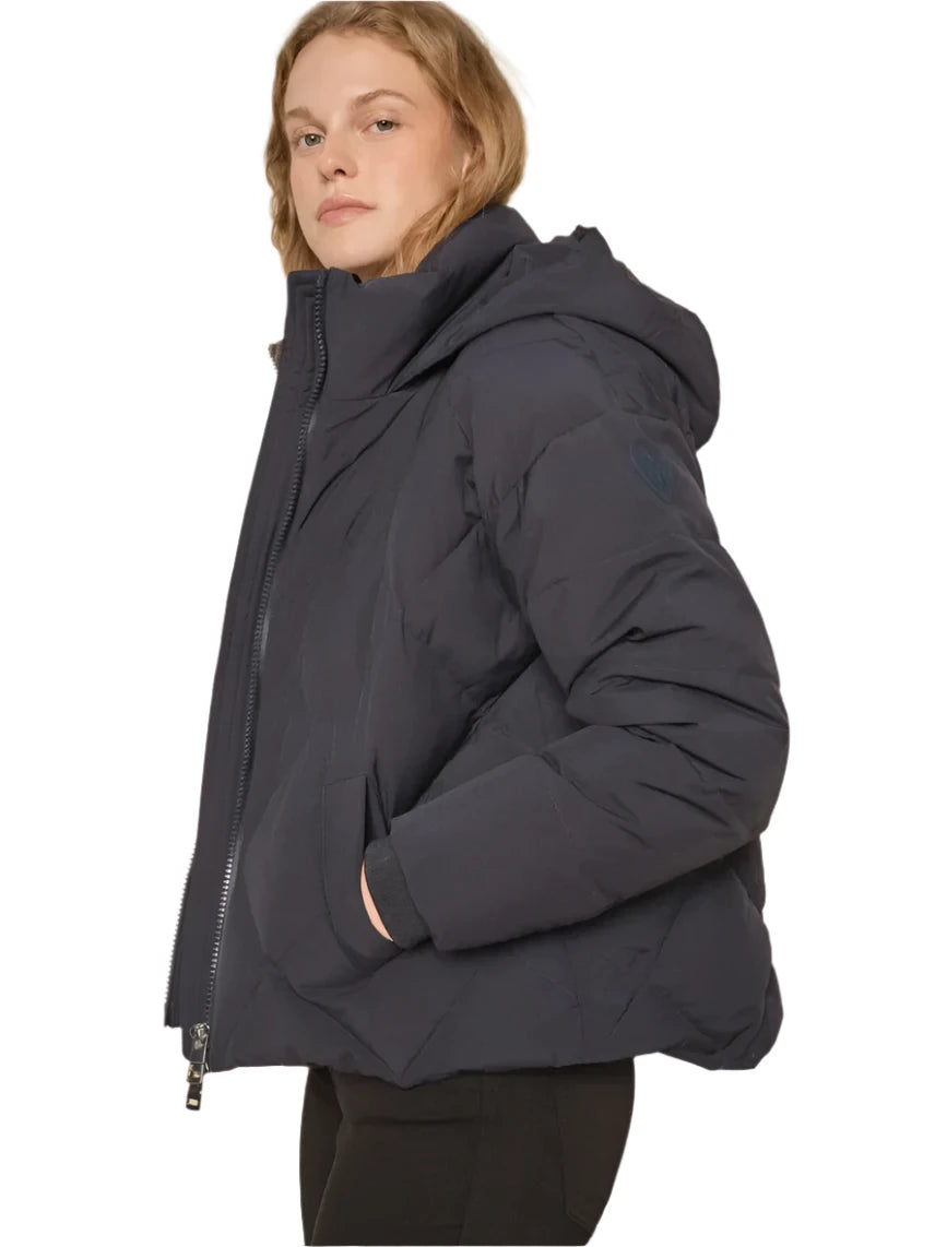 navy blue down jacket with diamond stitch design, zipped away hood and side pockets  model shot 